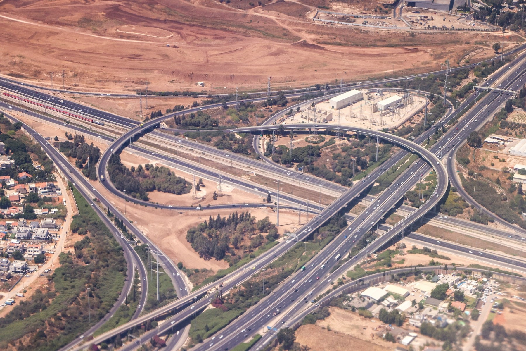 Aerial view of a highway interchange used as an analogy for HNSW shortcuts and local navigation